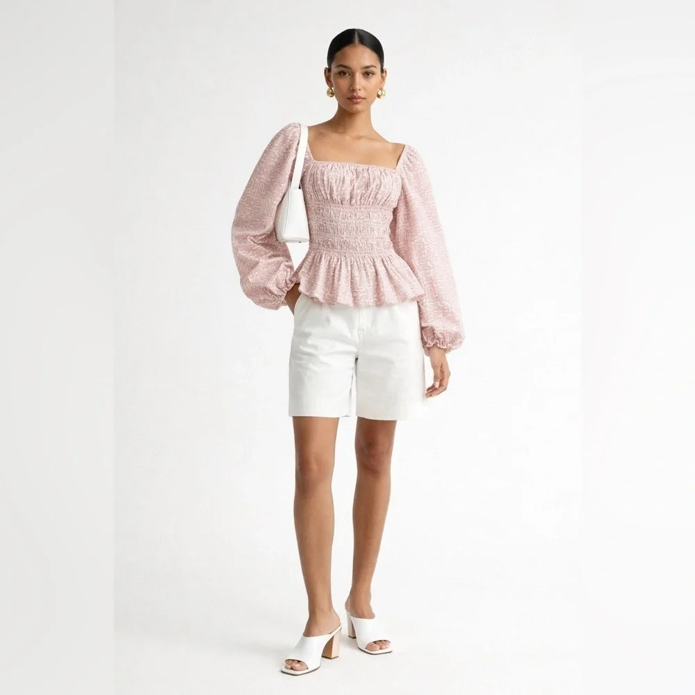 STAUD Jules smocked puff-sleeve peplum top in pink & cream 